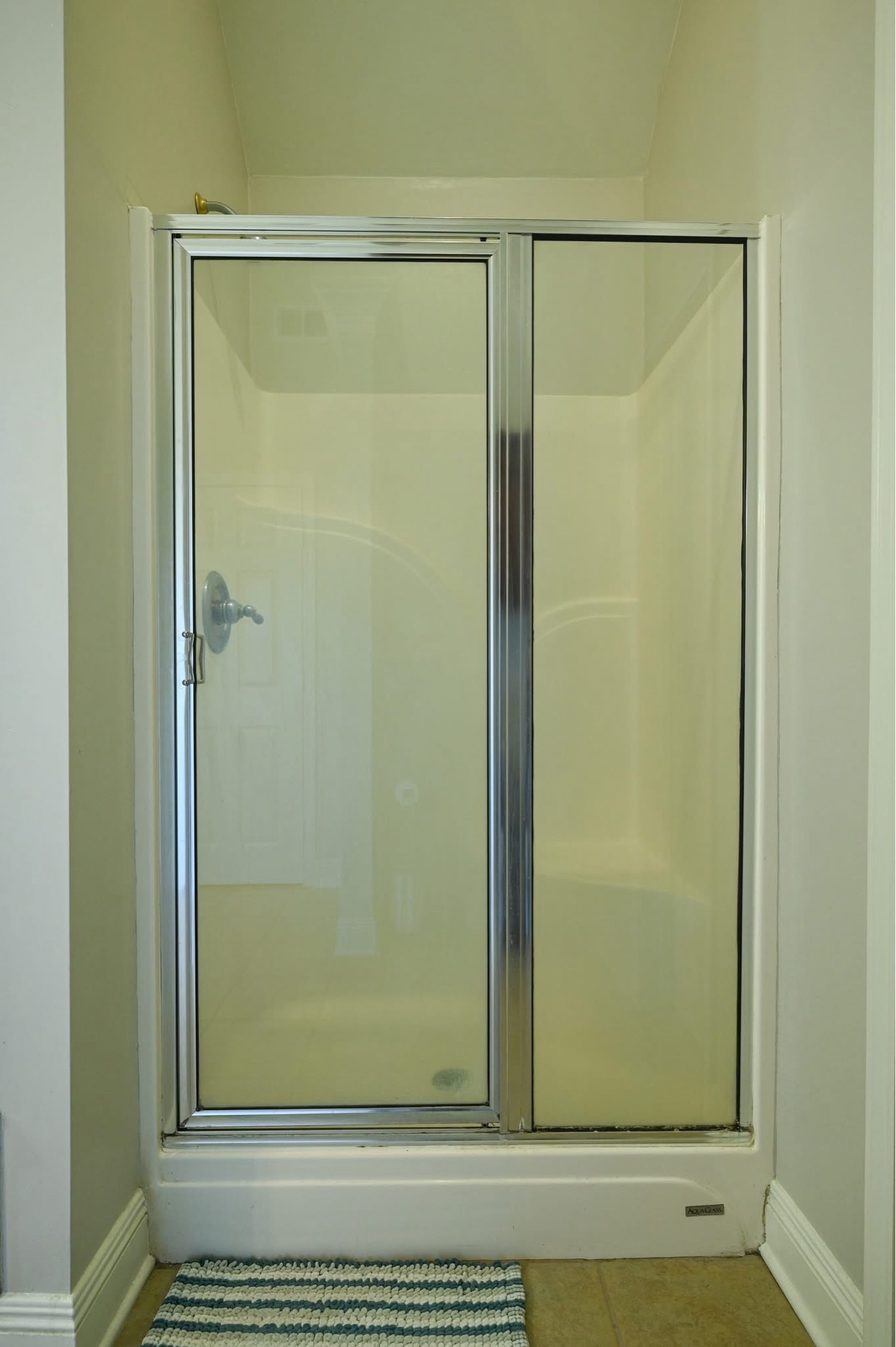 Shower before — fiberglass stall