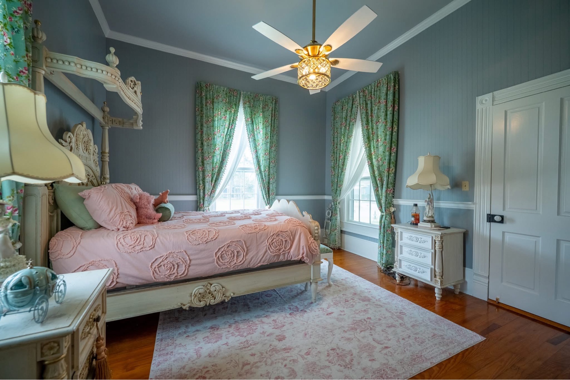 Bedroom after — restored historic room with slate blue walls
