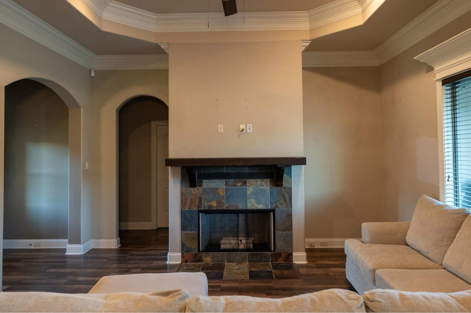 Fireplace before — dated slate tile surround