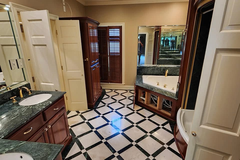 Master bath before — green marble and checkerboard floor