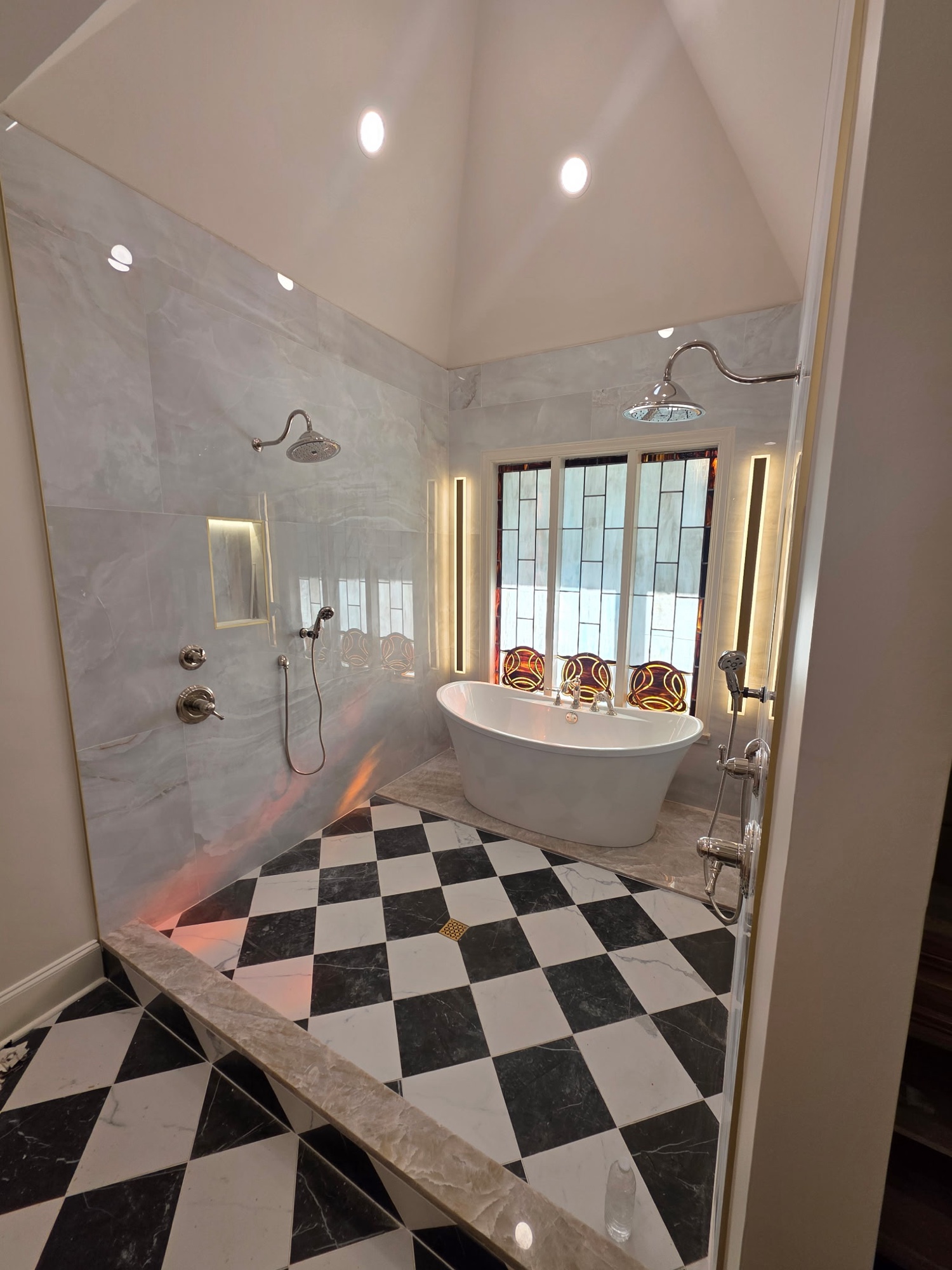 Freestanding tub on checker floor