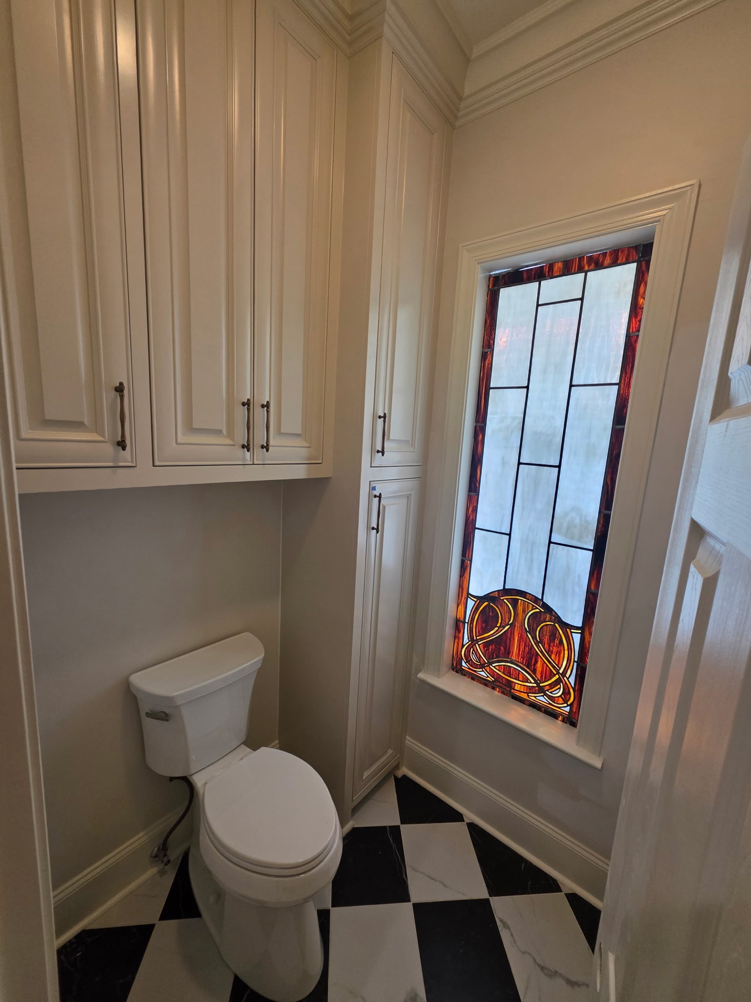 Bathroom with arched window