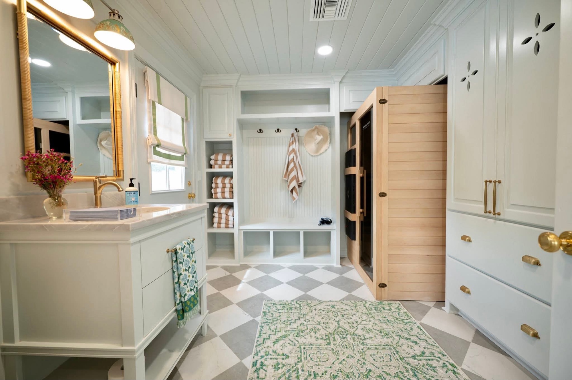 Mudroom with checker floor and cedar sauna