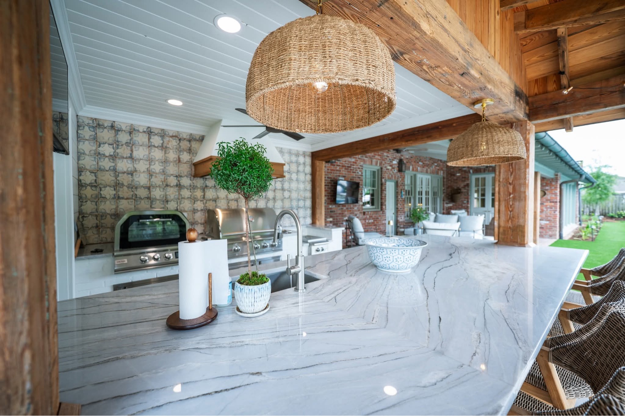Covered outdoor patio with rattan stools