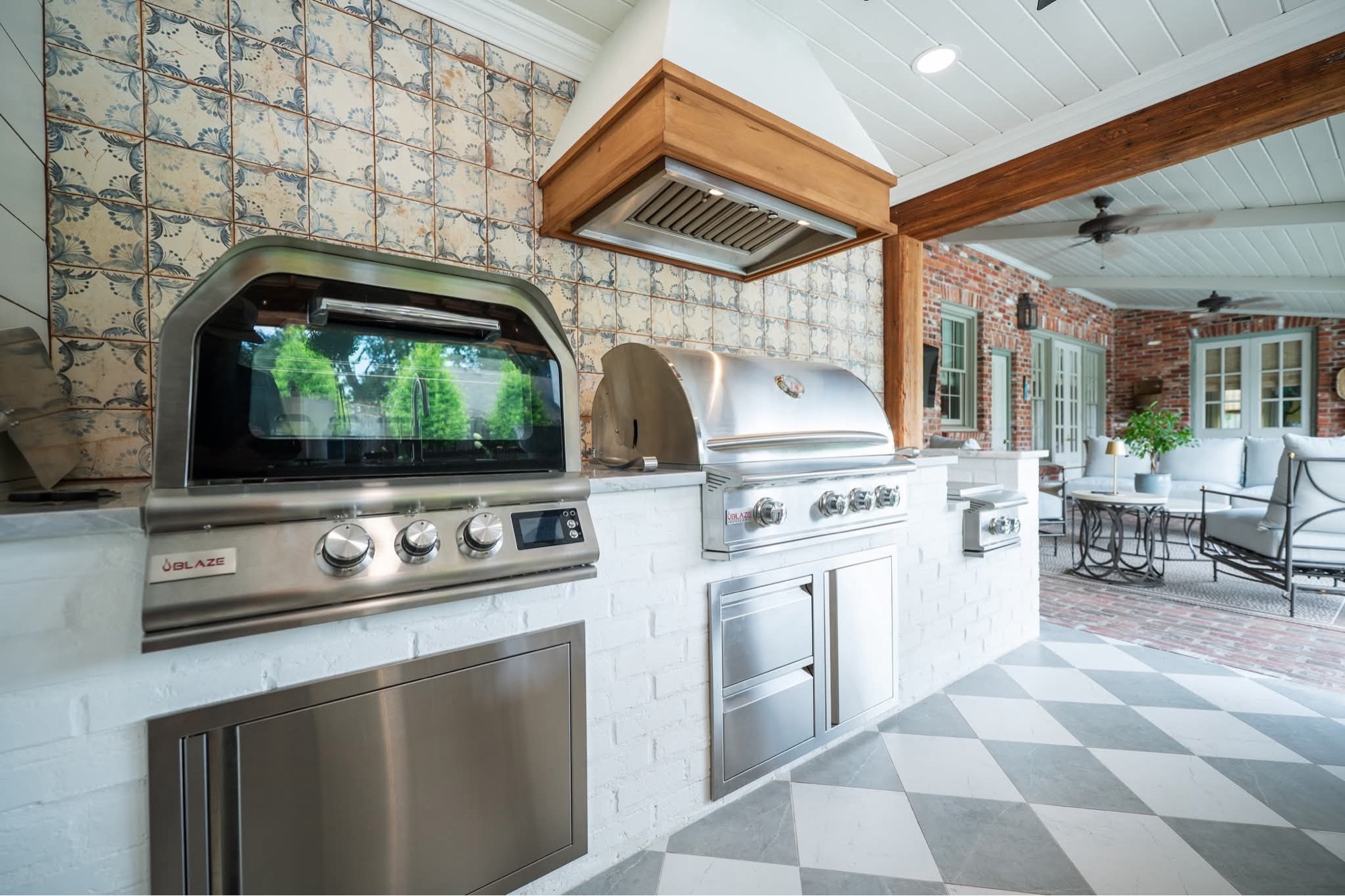 Outdoor grill area with tile backdrop